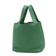 Pre-owned Leather handbags Hermès Vintage , Green , Dames