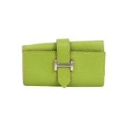 Pre-owned Leather key-holders Hermès Vintage , Green , Dames