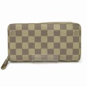 Pre-owned Fabric wallets Louis Vuitton Vintage , Beige , Dames