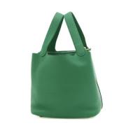 Pre-owned Leather handbags Hermès Vintage , Green , Dames