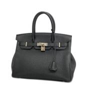 Pre-owned Leather handbags Hermès Vintage , Black , Dames