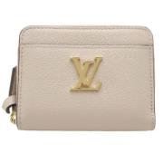 Pre-owned Leather wallets Louis Vuitton Vintage , Beige , Dames