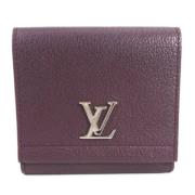 Pre-owned Leather wallets Louis Vuitton Vintage , Purple , Dames