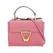 Roze Pebble Leren Handtas Coccinelle , Pink , Dames