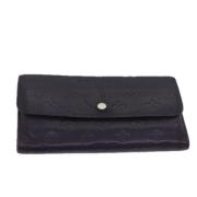 Pre-owned Leather wallets Louis Vuitton Vintage , Purple , Dames