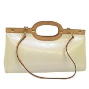 Pre-owned Leather handbags Louis Vuitton Vintage , Beige , Dames