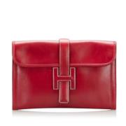 Pre-owned Leather clutches Hermès Vintage , Red , Dames