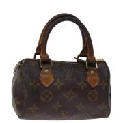 Pre-owned Canvas handbags Louis Vuitton Vintage , Brown , Dames