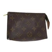 Pre-owned Canvas pouches Louis Vuitton Vintage , Brown , Dames