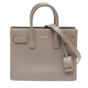 Pre-owned Leather handbags Yves Saint Laurent Vintage , Gray , Dames