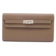 Pre-owned Leather wallets Hermès Vintage , Beige , Dames