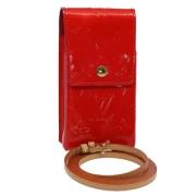 Pre-owned Leather pouches Louis Vuitton Vintage , Red , Dames