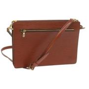 Pre-owned Leather clutches Louis Vuitton Vintage , Brown , Dames