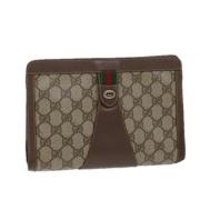 Pre-owned Leather clutches Gucci Vintage , Beige , Dames