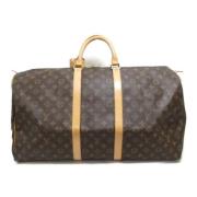 Pre-owned Fabric handbags Louis Vuitton Vintage , Brown , Dames