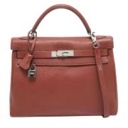 Pre-owned Leather handbags Hermès Vintage , Red , Dames