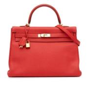 Pre-owned Leather handbags Hermès Vintage , Red , Dames