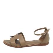 Pre-owned Leather sandals Hermès Vintage , Beige , Dames