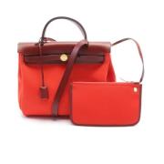 Pre-owned Leather handbags Hermès Vintage , Red , Dames