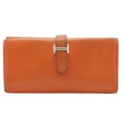 Pre-owned Leather wallets Hermès Vintage , Orange , Dames