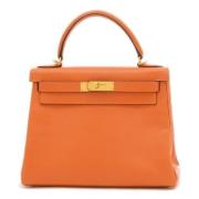 Pre-owned Leather handbags Hermès Vintage , Orange , Dames