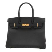 Pre-owned Leather handbags Hermès Vintage , Black , Dames