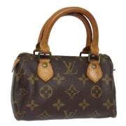 Pre-owned Canvas handbags Louis Vuitton Vintage , Brown , Dames