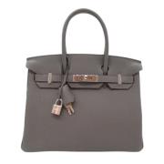 Pre-owned Leather handbags Hermès Vintage , Gray , Dames