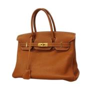 Pre-owned Leather handbags Hermès Vintage , Brown , Dames