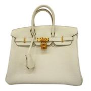 Pre-owned Leather handbags Hermès Vintage , Beige , Dames