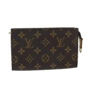 Pre-owned Canvas pouches Louis Vuitton Vintage , Brown , Dames