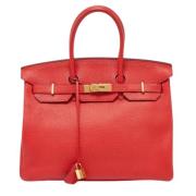 Pre-owned Leather totes Hermès Vintage , Red , Dames