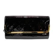 Pre-owned Leather clutches Louis Vuitton Vintage , Red , Dames