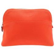 Pre-owned Cotton pouches Hermès Vintage , Orange , Dames