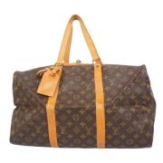 Pre-owned Canvas travel-bags Louis Vuitton Vintage , Brown , Dames