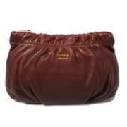 Pre-owned Leather clutches Prada Vintage , Brown , Dames