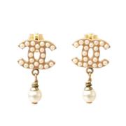 Pre-owned Metal earrings Chanel Vintage , Yellow , Dames