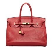 Pre-owned Leather handbags Hermès Vintage , Red , Dames