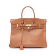 Pre-owned Canvas handbags Hermès Vintage , Brown , Dames