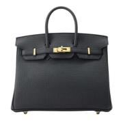 Pre-owned Leather handbags Hermès Vintage , Black , Dames