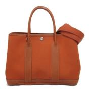 Pre-owned Canvas handbags Hermès Vintage , Orange , Dames