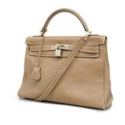 Pre-owned Leather handbags Hermès Vintage , Beige , Dames