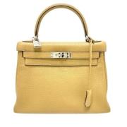 Pre-owned Leather handbags Hermès Vintage , Beige , Dames