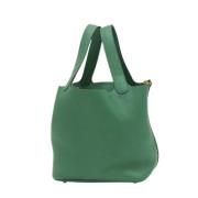 Pre-owned Leather handbags Hermès Vintage , Green , Dames