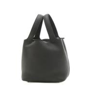 Pre-owned Leather handbags Hermès Vintage , Black , Dames