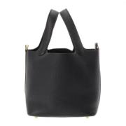 Pre-owned Leather handbags Hermès Vintage , Black , Unisex