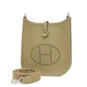 Pre-owned Leather shoulder-bags Hermès Vintage , Beige , Dames