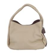 Pre-owned Leather handbags Coach Pre-owned , Beige , Dames