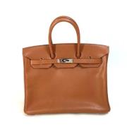 Pre-owned Fabric handbags Hermès Vintage , Brown , Dames