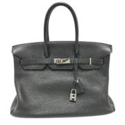 Pre-owned Leather handbags Hermès Vintage , Black , Dames